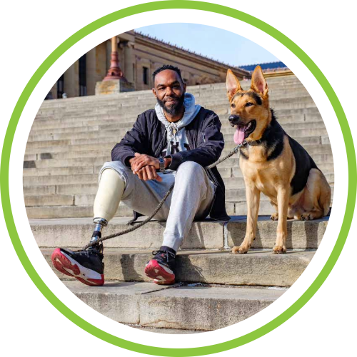 Damon and his dog sitting on steps